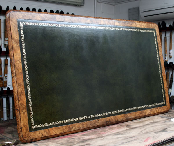 Traditional leather lining of desk top