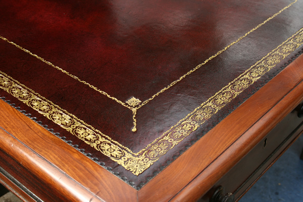 Leather lining and gold tooling